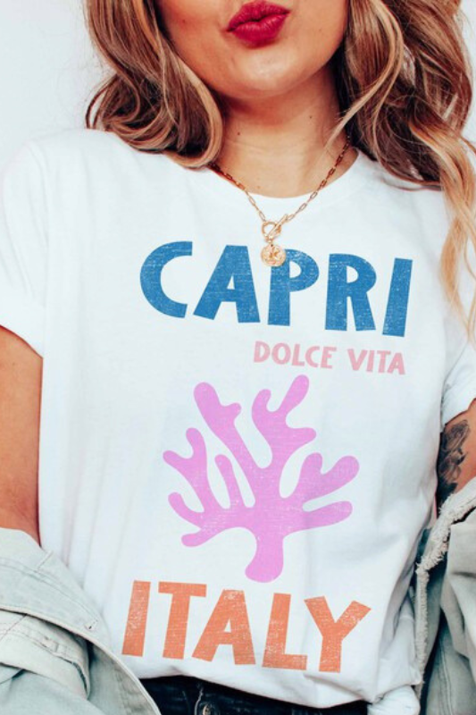 Colorful Capri, Italy graphic tee, worn by a woman from the front.