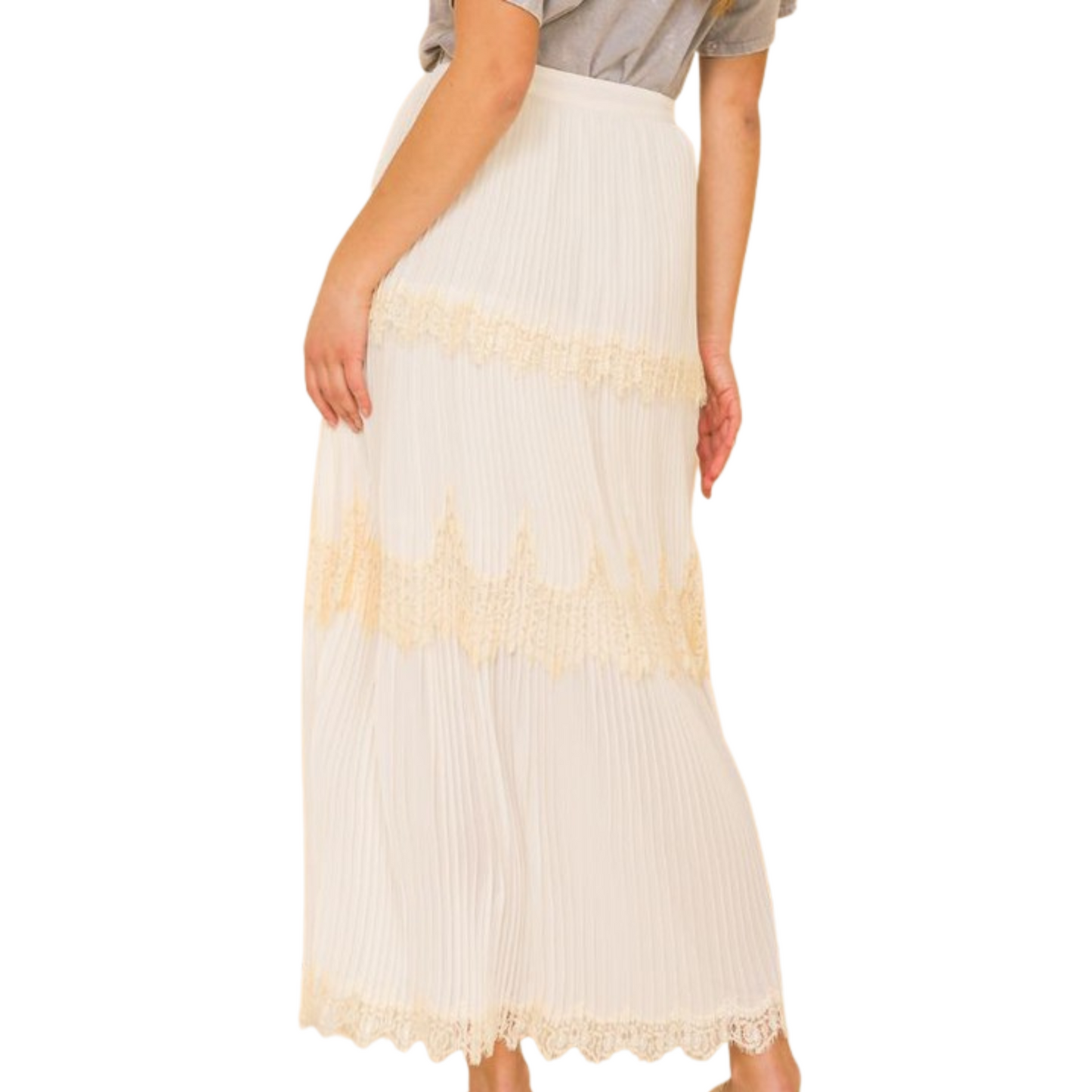 Maxi skirt with lace detailing, pleating, and a side zipper, worn by a woman from the back.