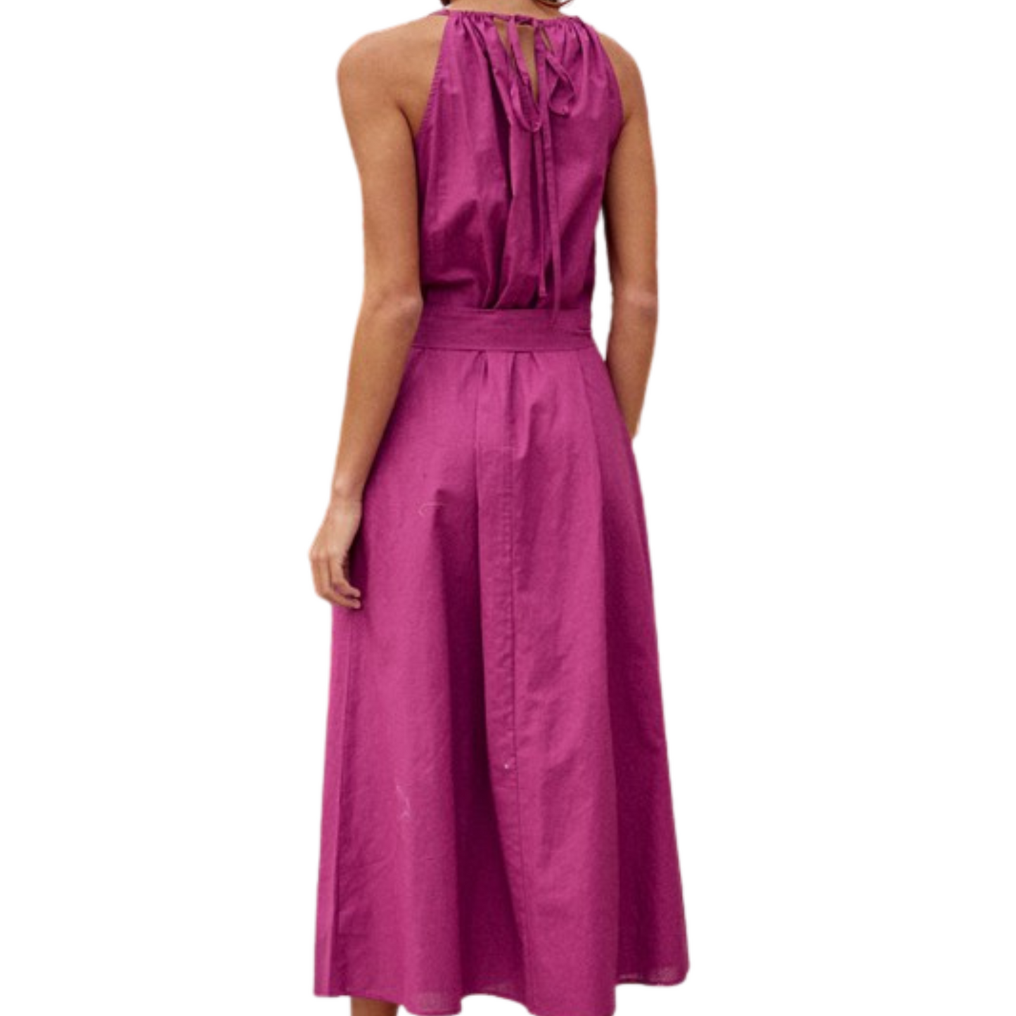 Deep purple maxi dress with halter neckline, pockets and tie, worn by a woman from the back.