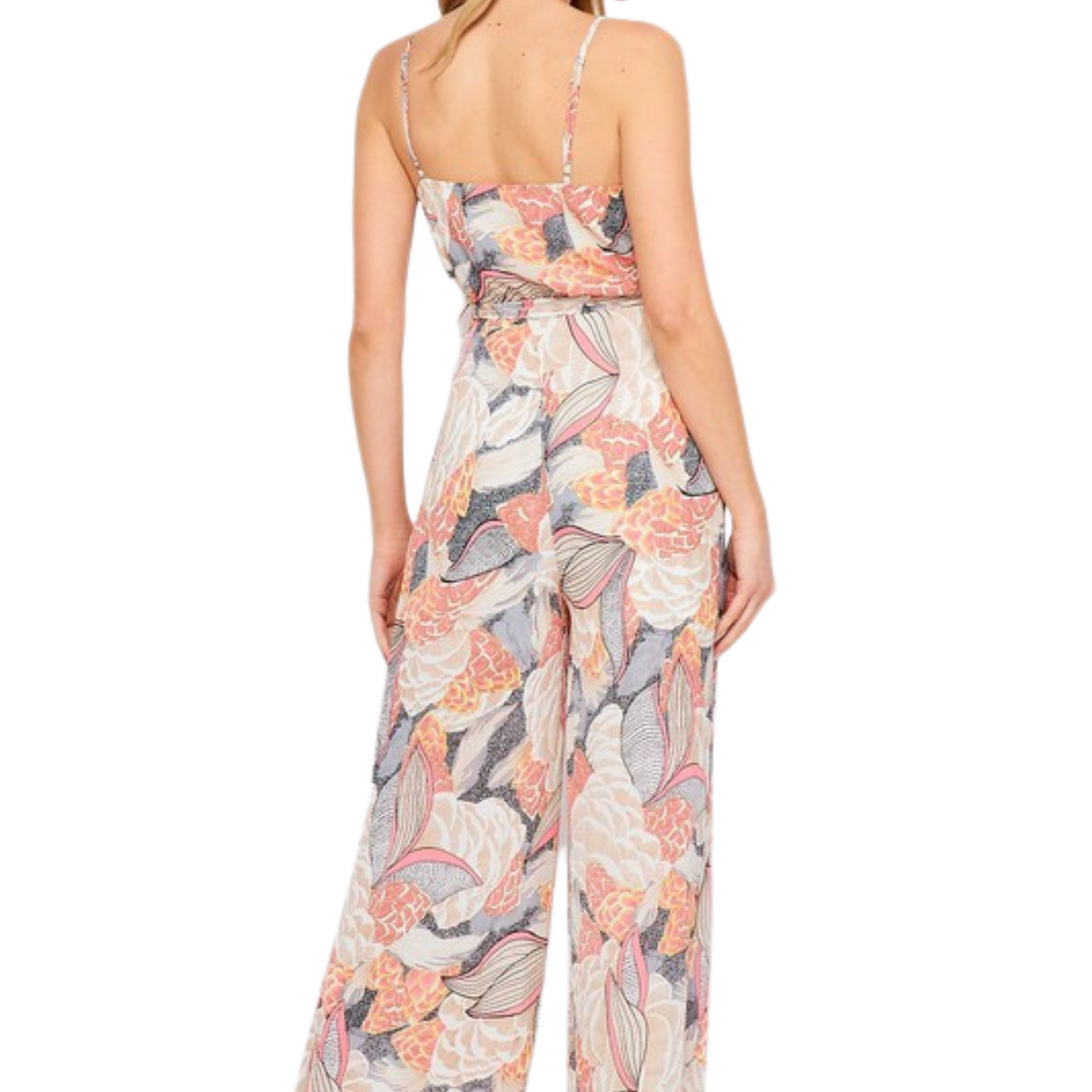 Multicolor jumpsuit with floral pattern and tie, worn by a woman from the back.